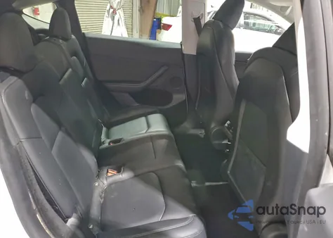 2023 Tesla Model Y from USA, damaged, VIN 7SAYGDEF2PA049120